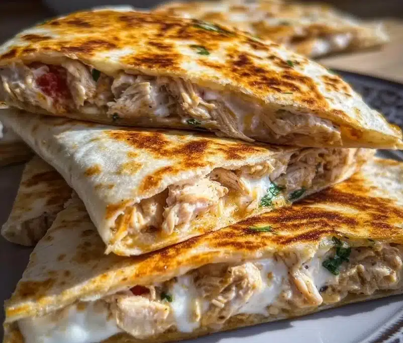 High-protein chicken ranch quesadilla with melted cheese and fresh ingredients.