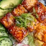 Fresh salmon bowl with vibrant vegetables and grains