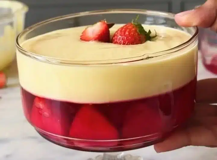 Delicious jelly custard trifle dessert with layers of jelly and custard