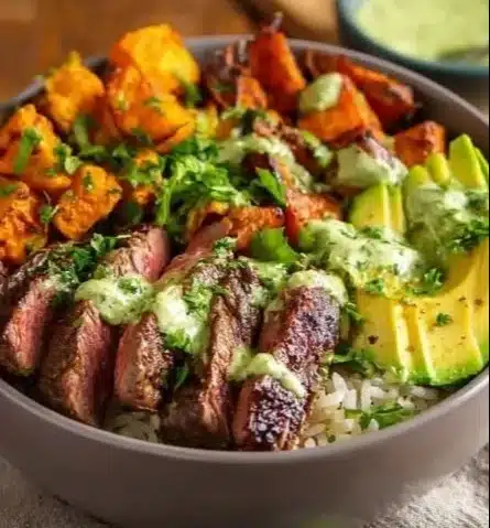 Steak Bowls with sweet potatoes and avocado-cilantro drizzle