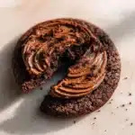 Delicious Copycat Dirt Cake Crumbl Cookies with chocolate and cream layers