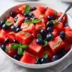 Honey Lime Fruit Salad with a variety of fresh fruits and honey-lime dressing