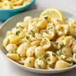 Delicious One Pot Garlic Butter Pasta served in a bowl with herbs