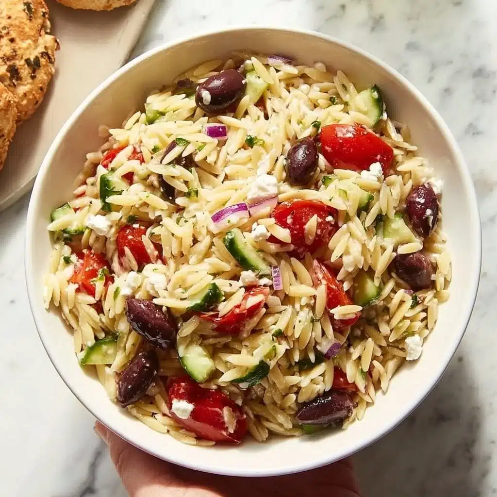 Delicious Greek Orzo Salad with vegetables and feta cheese